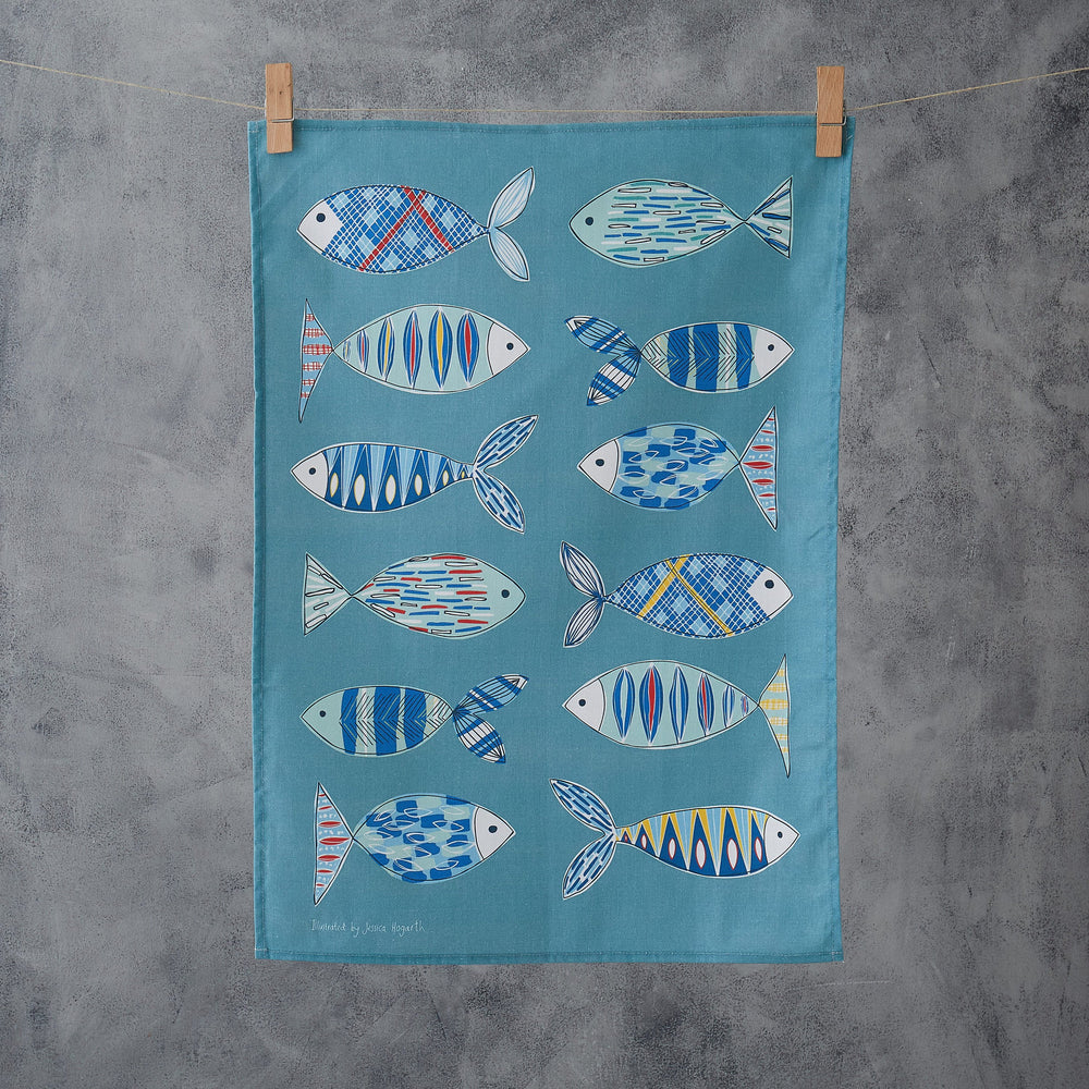 A blue fish tea towel from Jessica Hogarth Shop